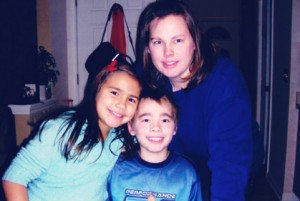 Ramiro with his mom and sister